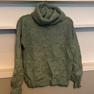 Crocheted green sweater with removable turtle neck
